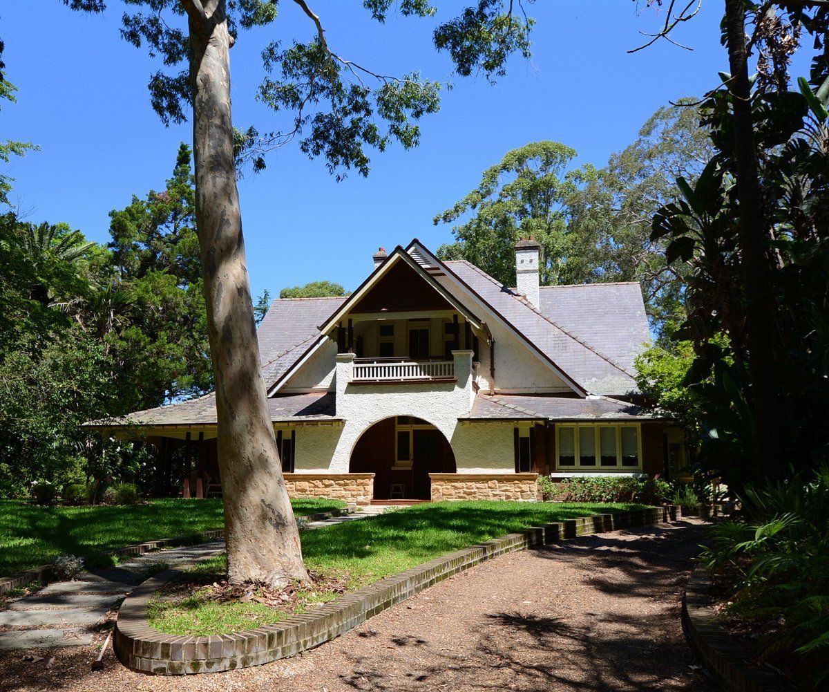 Mount Errington, an Arts and Crafts house in Hornsby with a large tree and garden